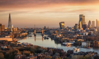 Panoramic, aerial view to the urban skyline of London during a golden sunrise