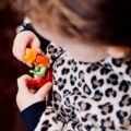 A child playing with a toy